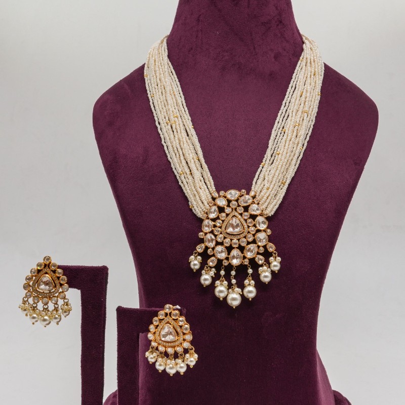 Floral Pearl Choker Set “Delicate blooms woven in gold and grace.”